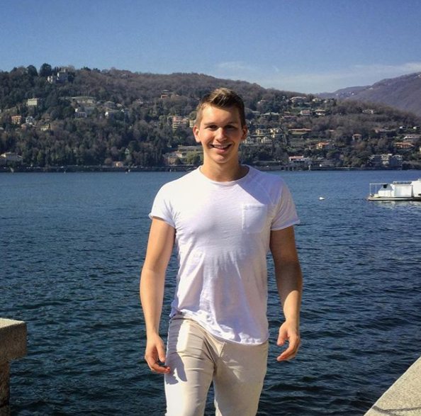 boy smiling handsome man young boy in front of lake italian lake lake como lago maggiore